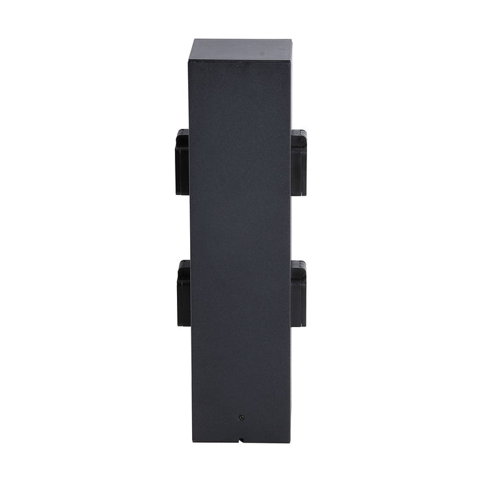 Black aluminium four socket outdoor garden power post unlit on a plain white studio background