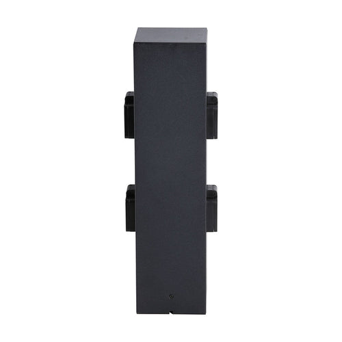 Black aluminium four socket outdoor garden power post unlit on a plain white studio background