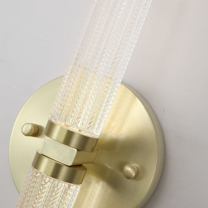 Detail of the Aberdeen light's round brass backplate and fluted glass tube collar