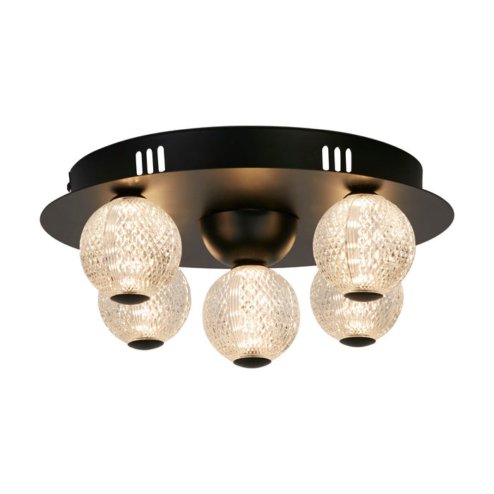 Asteroid matt black flush ceiling light with five faceted crystal-effect glass globes lit