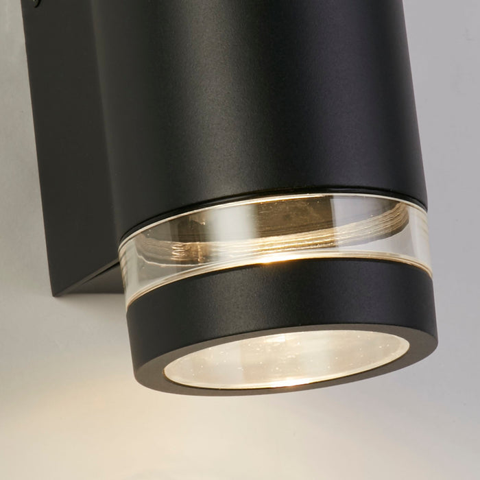 Close-up of the Austin cylinder's black finish clear glass ring and warm downward glow