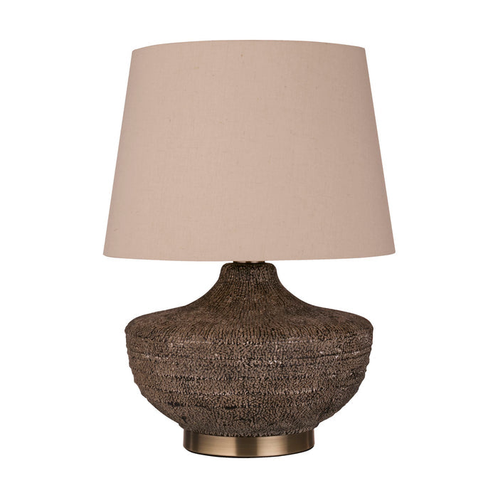 Avaya textured ceramic table lamp unlit with beige linen shade on a white studio background