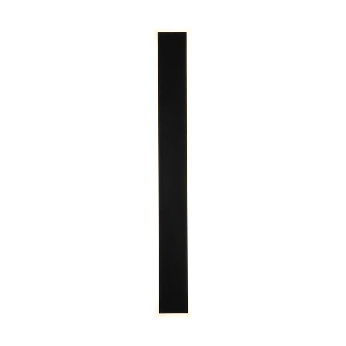 Bordo sand black LED wall light lit as a slim vertical bar with a glowing warm outline