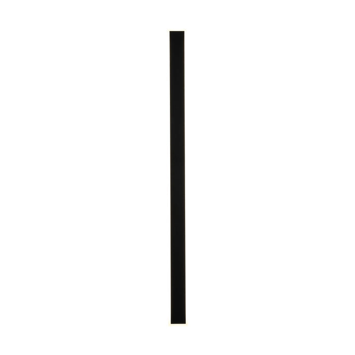Bordo sand black LED wall light lit as a tall slim bar with a continuous glowing edge