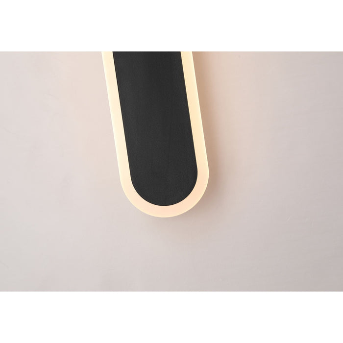 Close-up of the Bordo LED bar's rounded corner and glowing warm white acrylic edge detail
