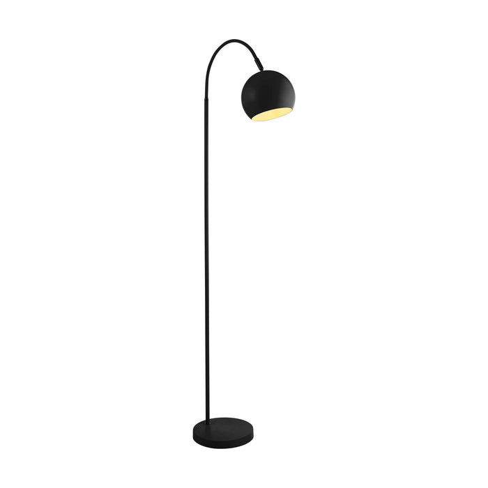 Calumn matt black floor lamp lit, arched stem with domed ball shade glowing warm on a round base