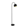 Calumn matt black floor lamp lit, arched stem with domed ball shade glowing warm on a round base