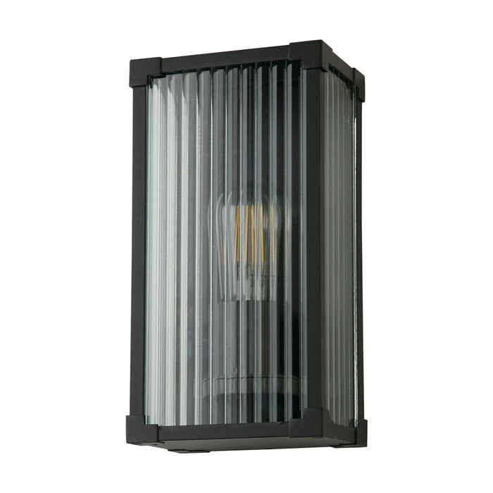 Cincinnati black outdoor wall lantern unlit on white, rectangular frame with ribbed glass panels