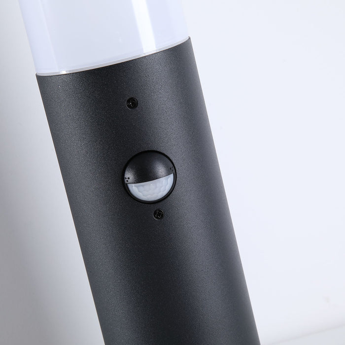 Close-up of the Colorado bollard's textured black post and circular PIR motion sensor