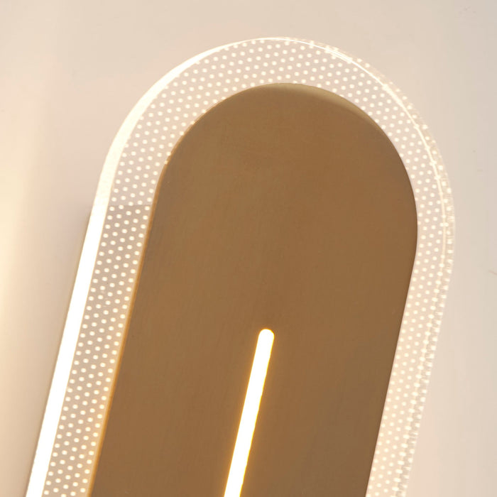 Detail of the Couper arch's brushed brass face and perforated illuminated border