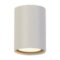 Cyls sand white wall light lit, aluminium cylinder with warm recessed lamp facing down