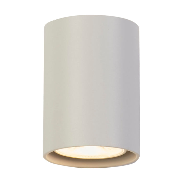 Cyls sand white wall light lit, aluminium cylinder with warm recessed lamp facing down