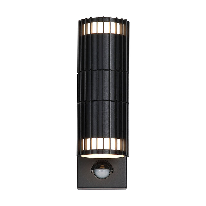 Detroit black up and down wall light lit with a ribbed cylinder and PIR sensor below