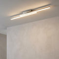 Modern satin nickel flush ceiling light with two offset linear LED bars glowing on a white ceiling.