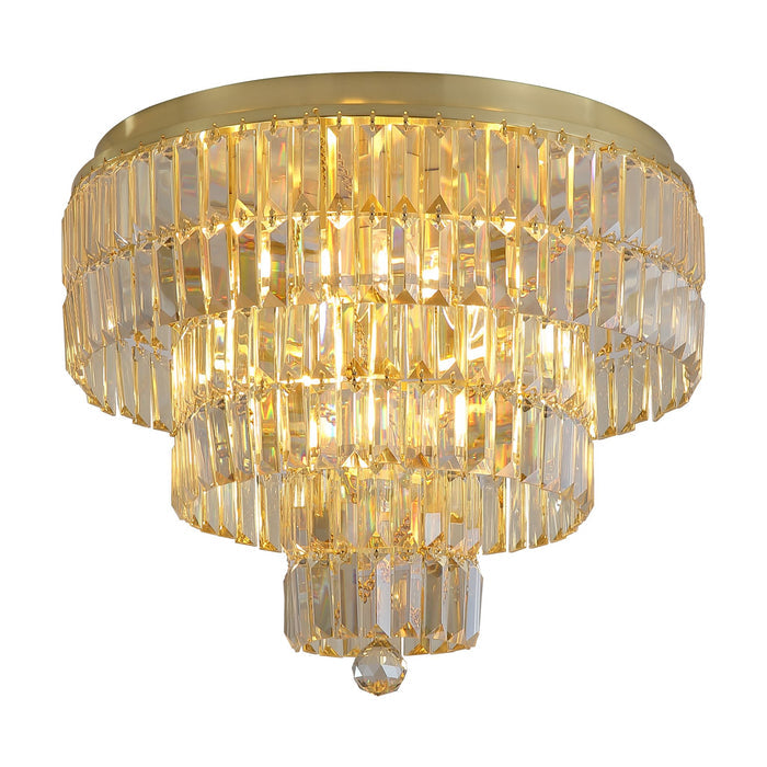 Empire satin brass flush ceiling light with six tiers of clear crystal prisms lit warmly