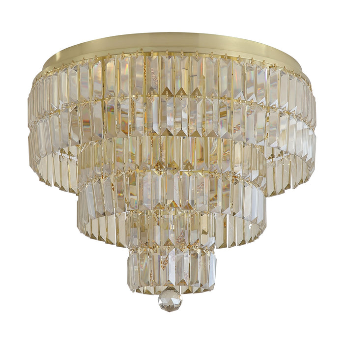 Empire satin brass tiered crystal flush ceiling light unlit against a white studio backdrop
