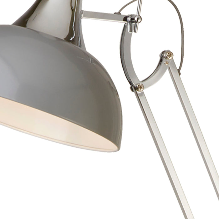 Close-up of the Goliath grey dome shade, chrome shade fitting and polished jointed arm linkage