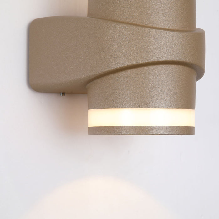Close-up of the Grip light's textured gold wrap and warm glowing opal strip