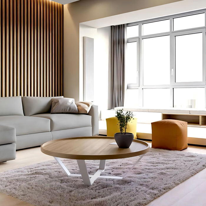 Living room with the Haolux white LED ceiling light above a pale sofa and round wood table