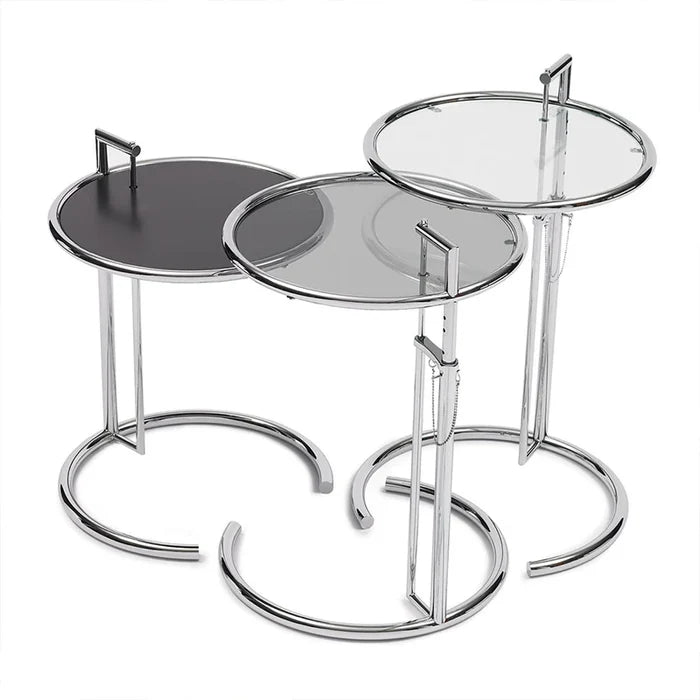 Height Adjustable Glass Side Table beside lounge chair