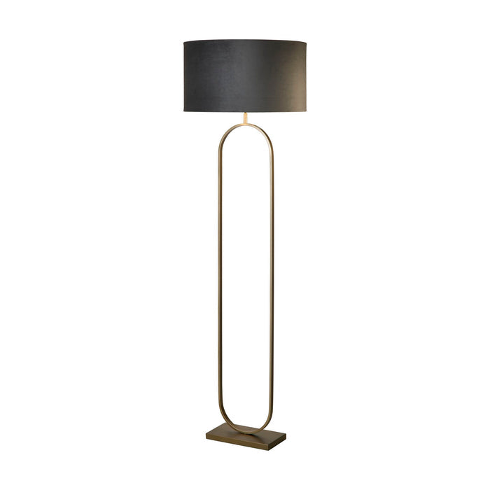 Modish bronze floor lamp lit with a dark grey velvet drum shade on an oval frame
