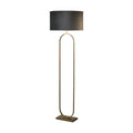 Modish bronze floor lamp lit with a dark grey velvet drum shade on an oval frame