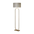 Modish bronze metal floor lamp lit with a grey velvet drum shade on an oval hoop stand