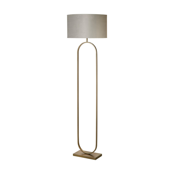 Modish bronze oval floor lamp unlit on white with grey velvet shade and rectangular base