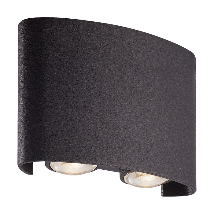 Shadows sand black curved wall light unlit on white showing four recessed LED lenses