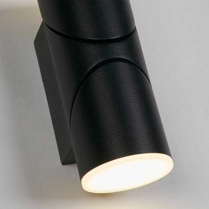 Close-up of the Soho cylinder's matt black finish and warm glowing lower diffuser