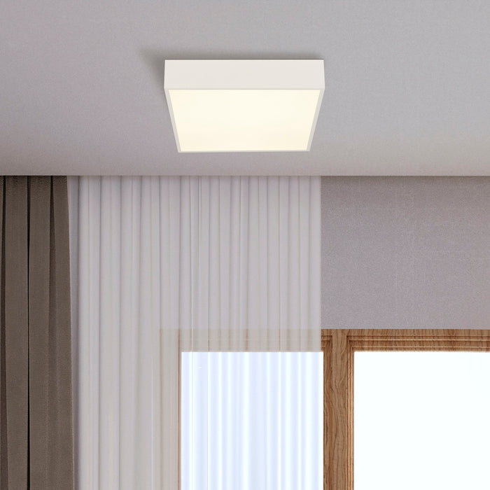 Bedroom corner with the Zeus white square ceiling light beside pleated curtains and window